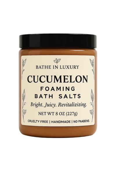 Jar of Cucumelon foaming bath salts with a black lid on a white background