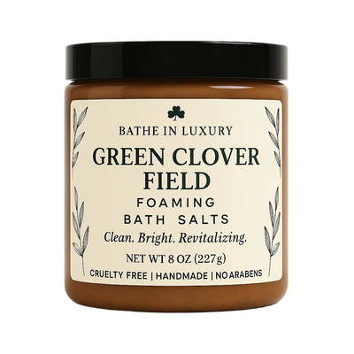 Jar of Green Clover Field foaming bath salts with a black lid on a white background