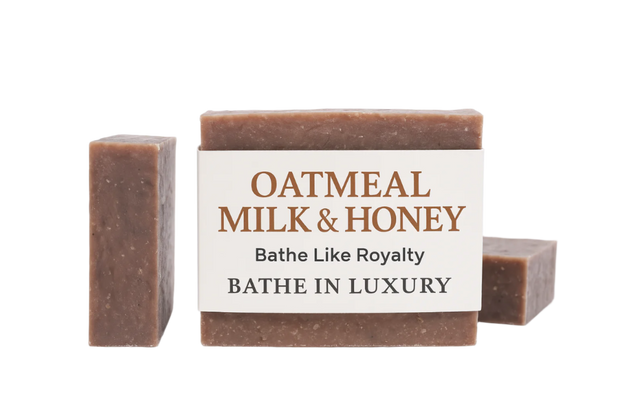Oatmeal milk and honey soap with packaging on a white background