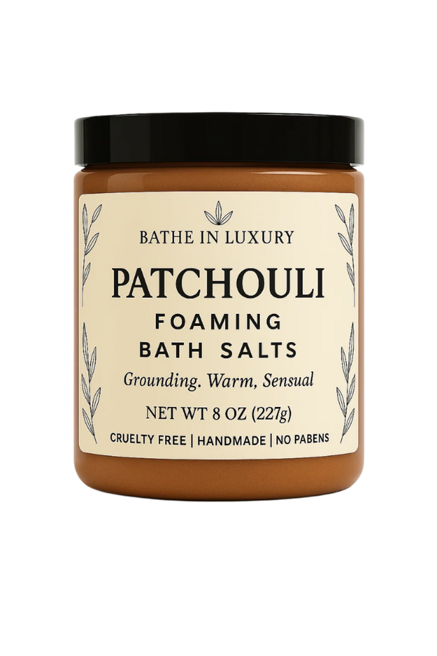Jar of patchouli foaming bath salts with a black lid on a white background
