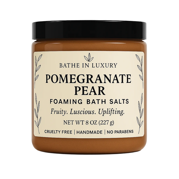 Jar of Pomegranate Pear foaming bath salts with a black lid on a white background