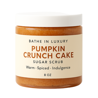 Jar of pumpkin crunch cake sugar scrub with a beige label on a white background