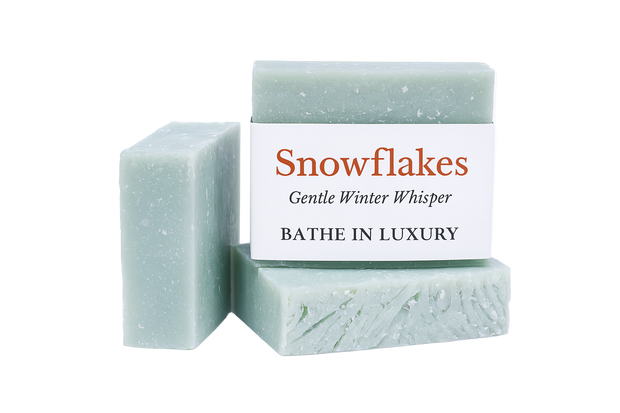 Two bars of soap with a 'Snowflakes' label on a white background