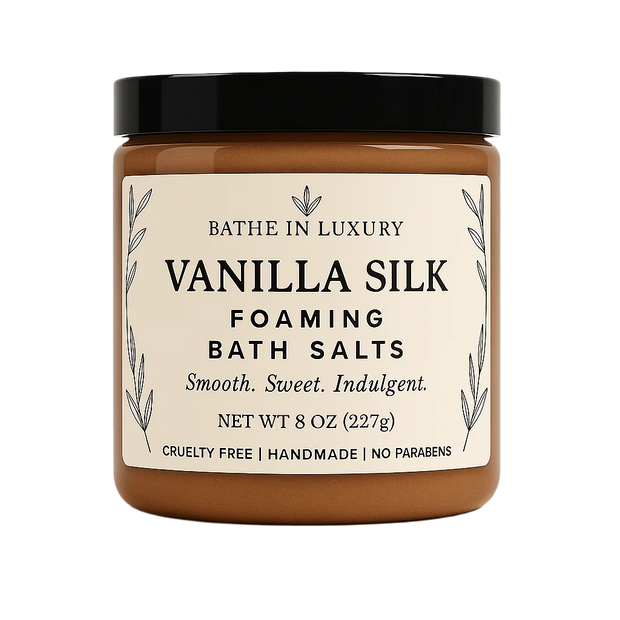 Jar of Vanilla Silk foaming bath salts with a black lid on a white background