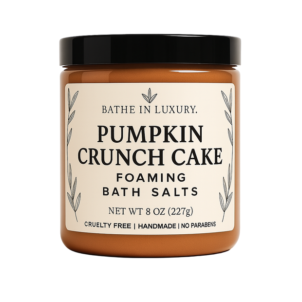 Jar of Pumpkin Crunch Cake foaming bath salts with a black lid on a white background
