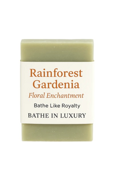 Bar of soap with 'Rainforest Gardenia' packaging on a white background